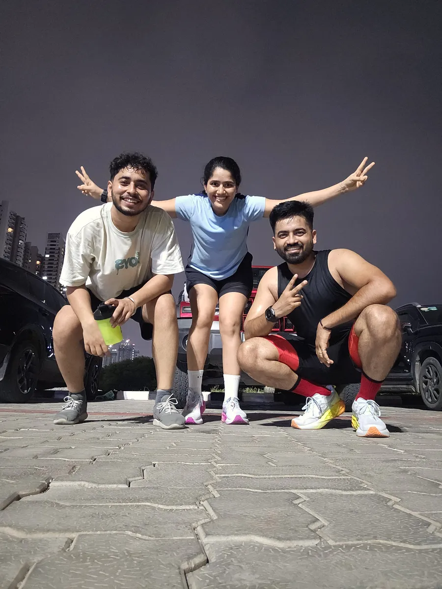 M³RC runners on a Friday evening run, Hyderabad skyline behind